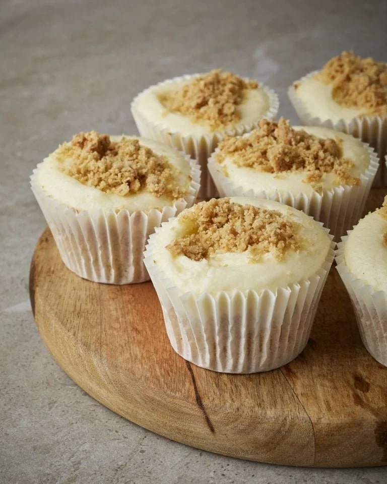 Delicious Apple Crumble Cupcakes topped with crumble topping and spiced apples