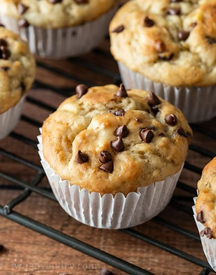 Banana muffins baked with chocolate chips, fresh and delicious treat.