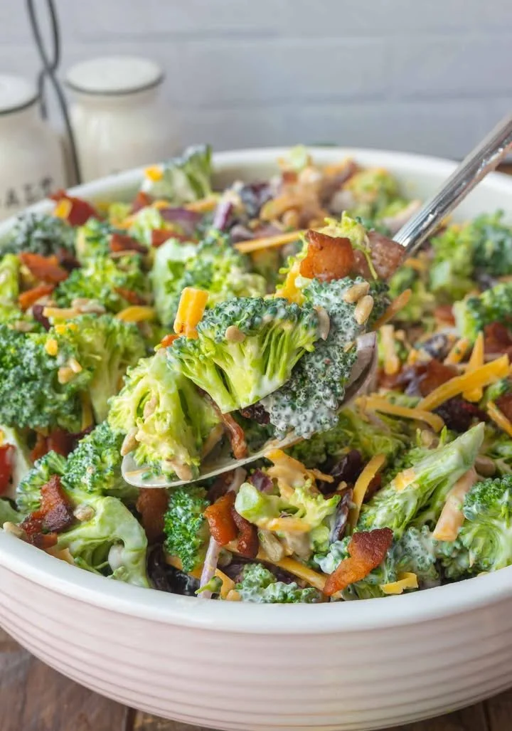 Colorful and fresh broccoli salad with healthy ingredients in a bowl.