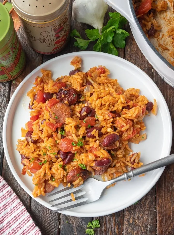 Delicious plate of Cajun Beans and Rice served with spices and herbs.