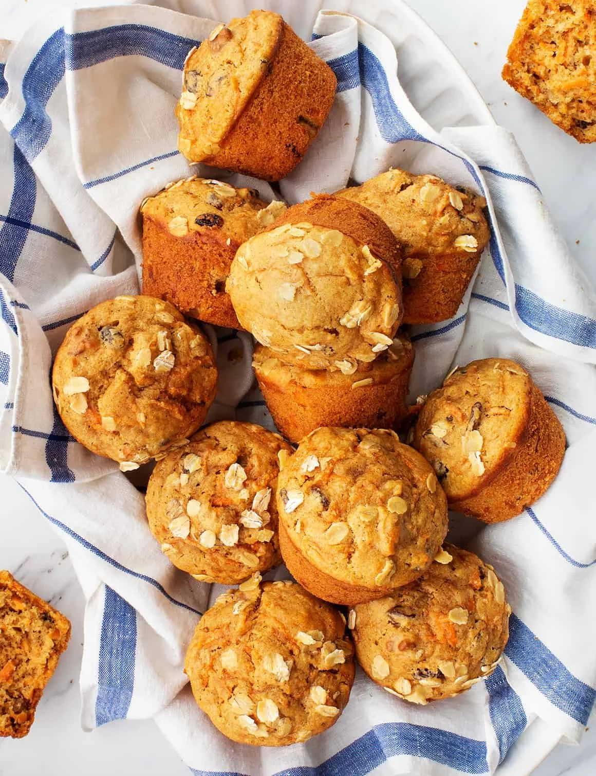 Delicious homemade carrot muffins with nuts and spices on a wooden table