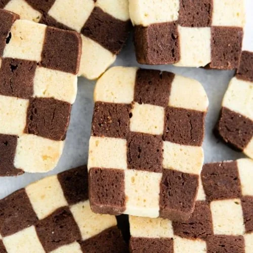 Delicious homemade checkerboard cookies with chocolate and vanilla layers.