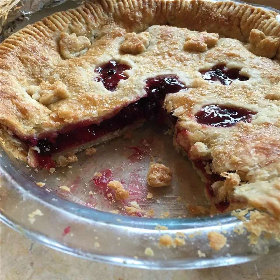 Delicious Cherry Blueberry Pie with a golden crust and fresh fruit filling