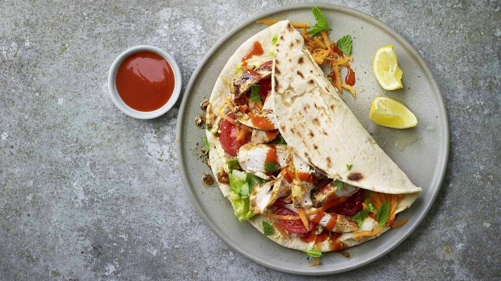 Delicious Chicken Kebab Wrap filled with fresh vegetables and grilled chicken.