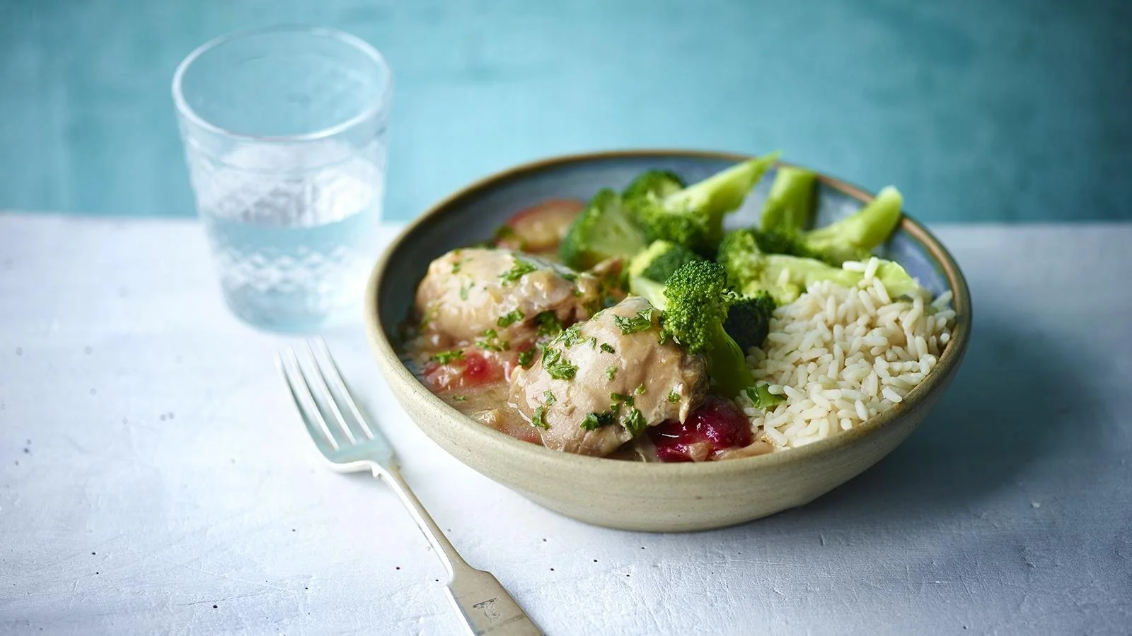 Delicious Chinese Plum Chicken served with rice and vegetables