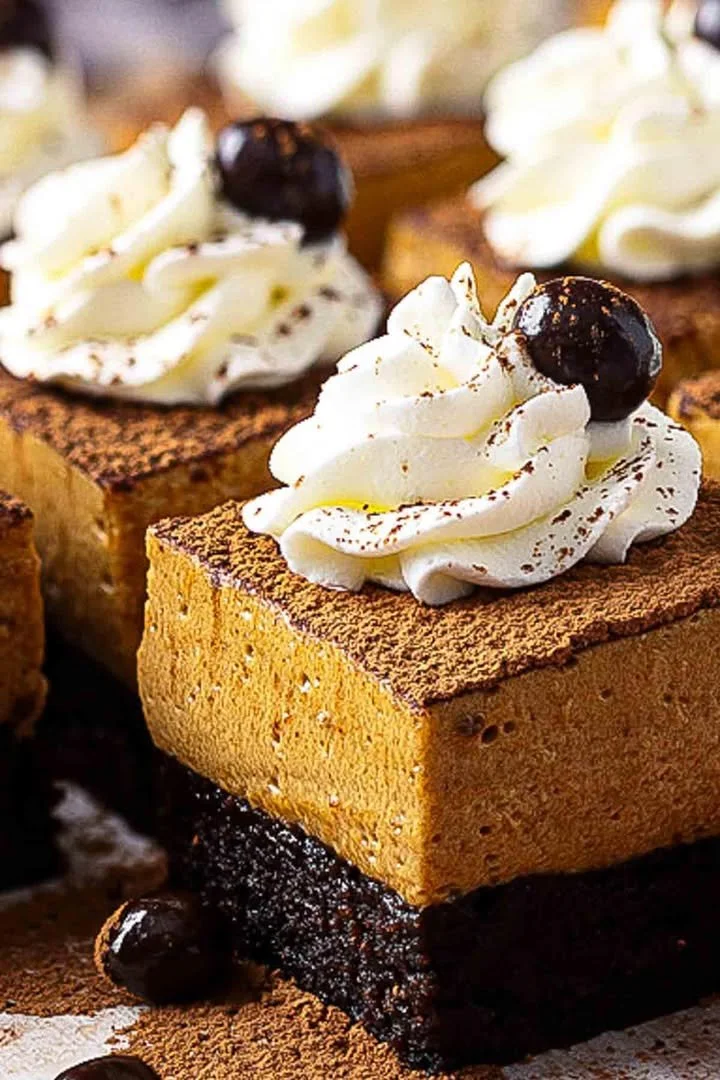 Delicious chocolate mousse brownies served on a plate, showcasing their rich texture