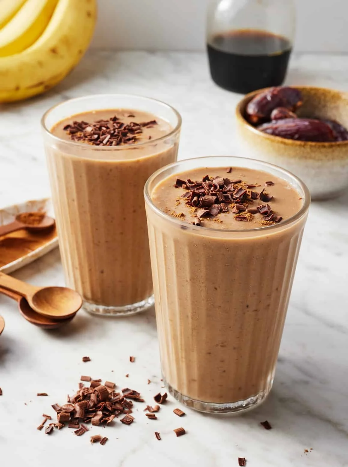Creamy coffee smoothie with fresh ingredients in a glass