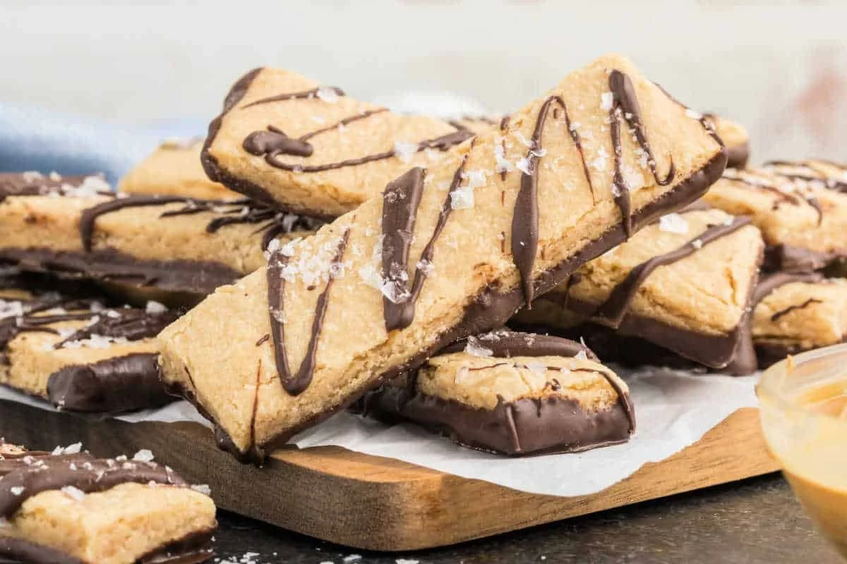 Dark chocolate peanut butter shortbread cookies displayed on a plate