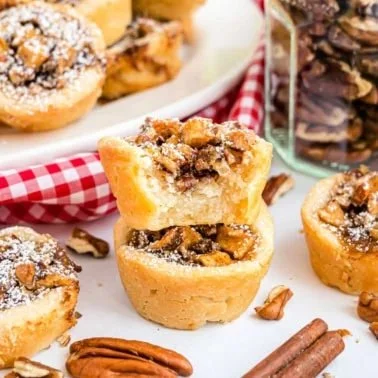 Delicious apple pecan cookie cups topped with pecans and a hint of cinnamon