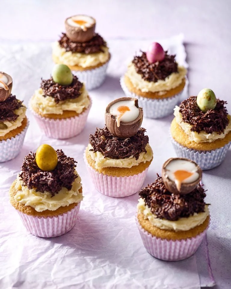 Colorful Easter cupcakes decorated with spring themes and festive designs