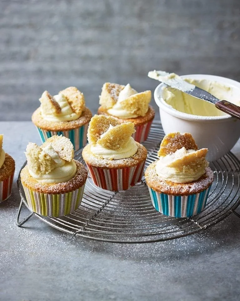 Easy butterfly cakes decorated with cream and colorful toppings.