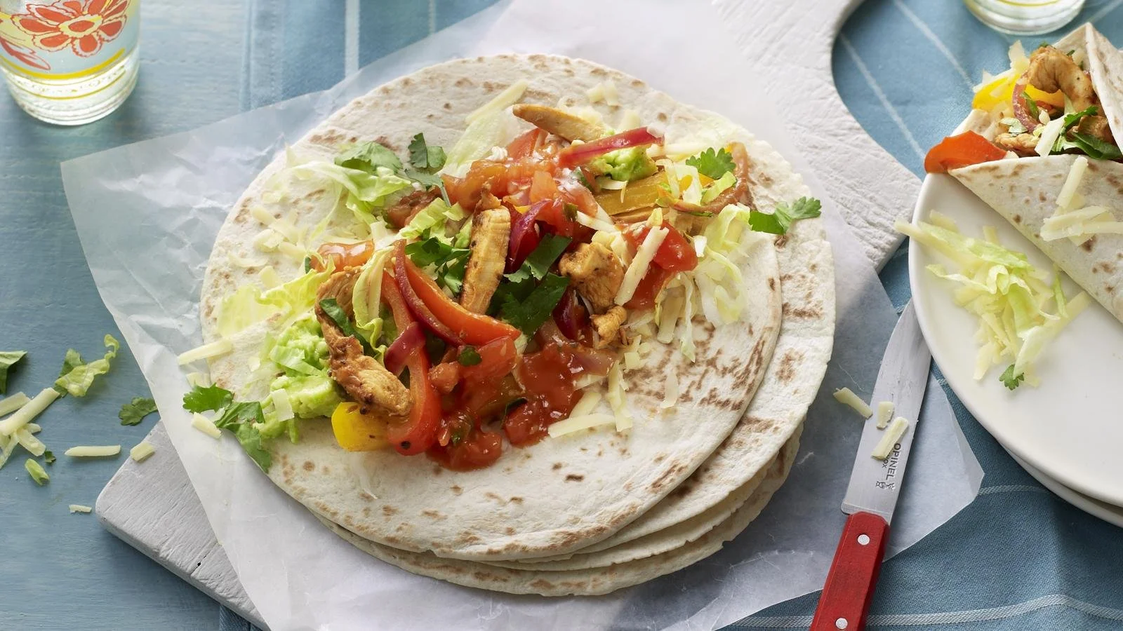 Easy chicken fajitas with colorful peppers and onions sizzling in a pan