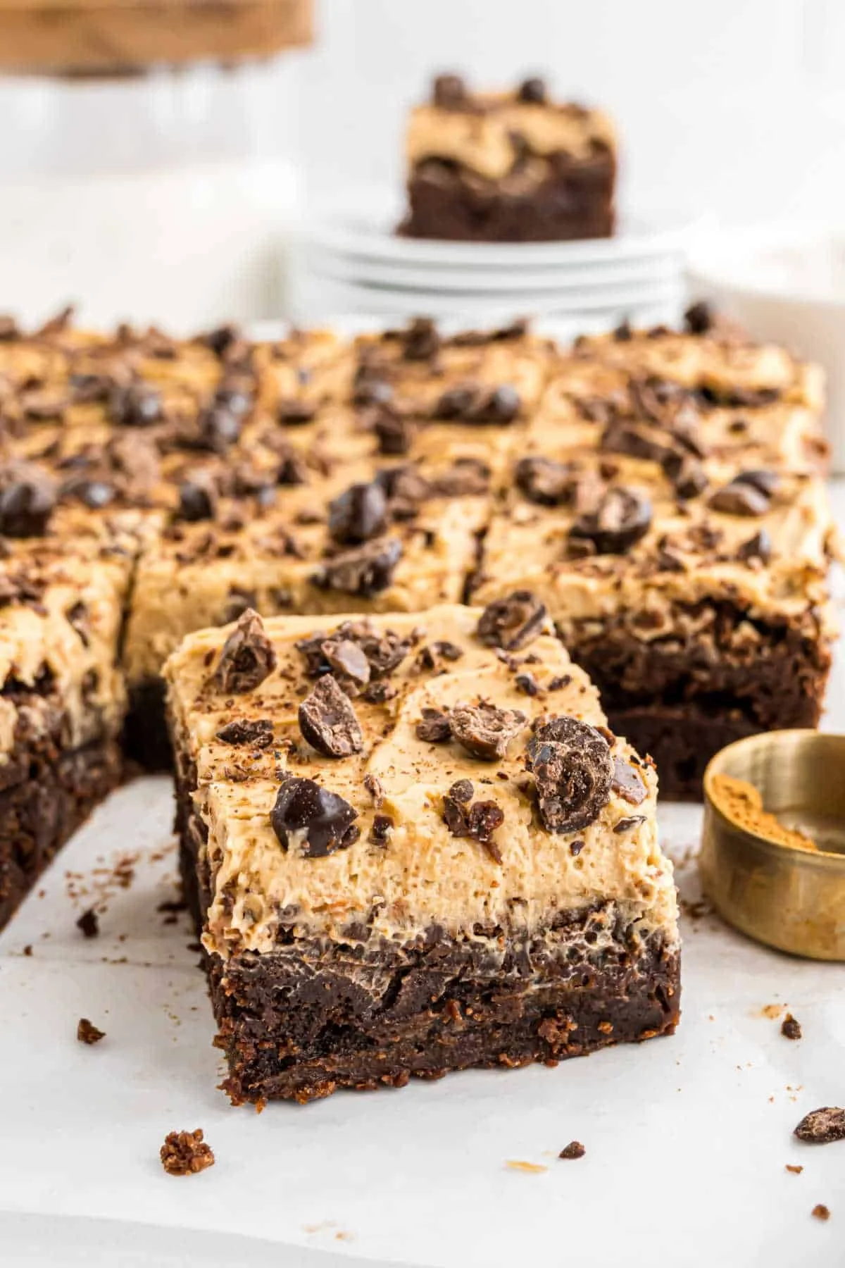 Delicious espresso brownies topped with a sprinkle of cocoa powder