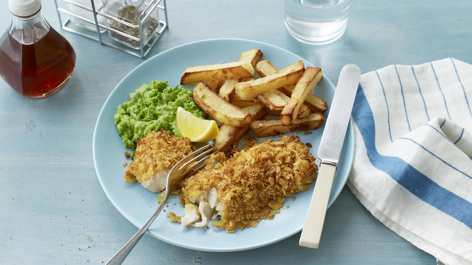 Delicious homemade fakeaway fish and chips served on a plate