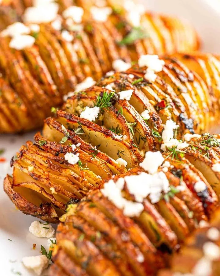 Greek Style Potatoes topped with Feta cheese and herbs