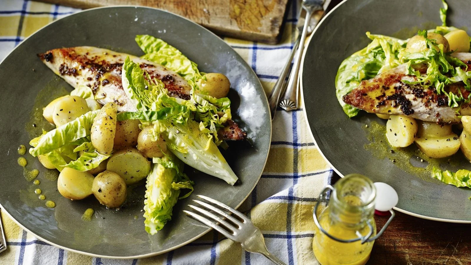 Grilled mackerel served with new potatoes and a fresh garden salad