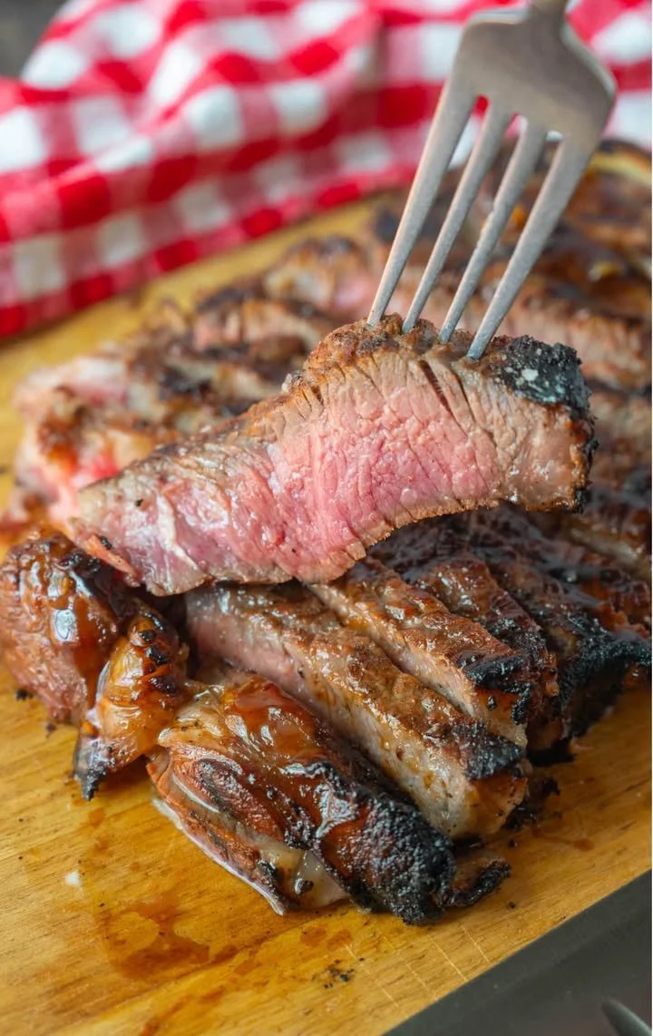 Delicious grilled teriyaki New York steak garnished with vegetables