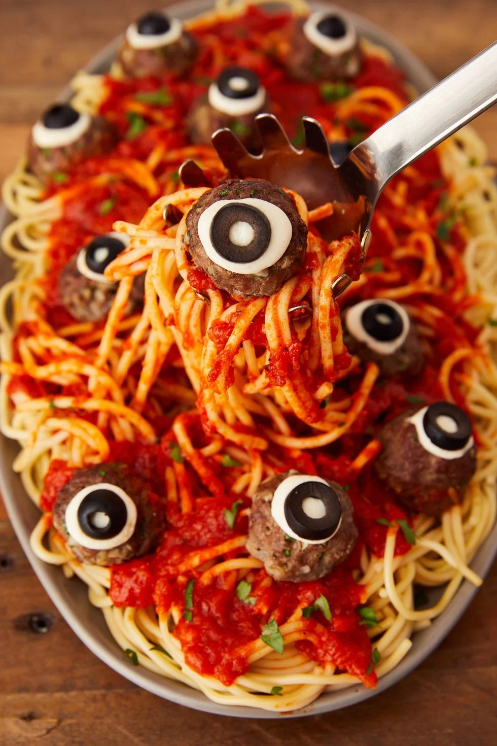 Delicious Halloween eyeball pasta served in a spooky setting