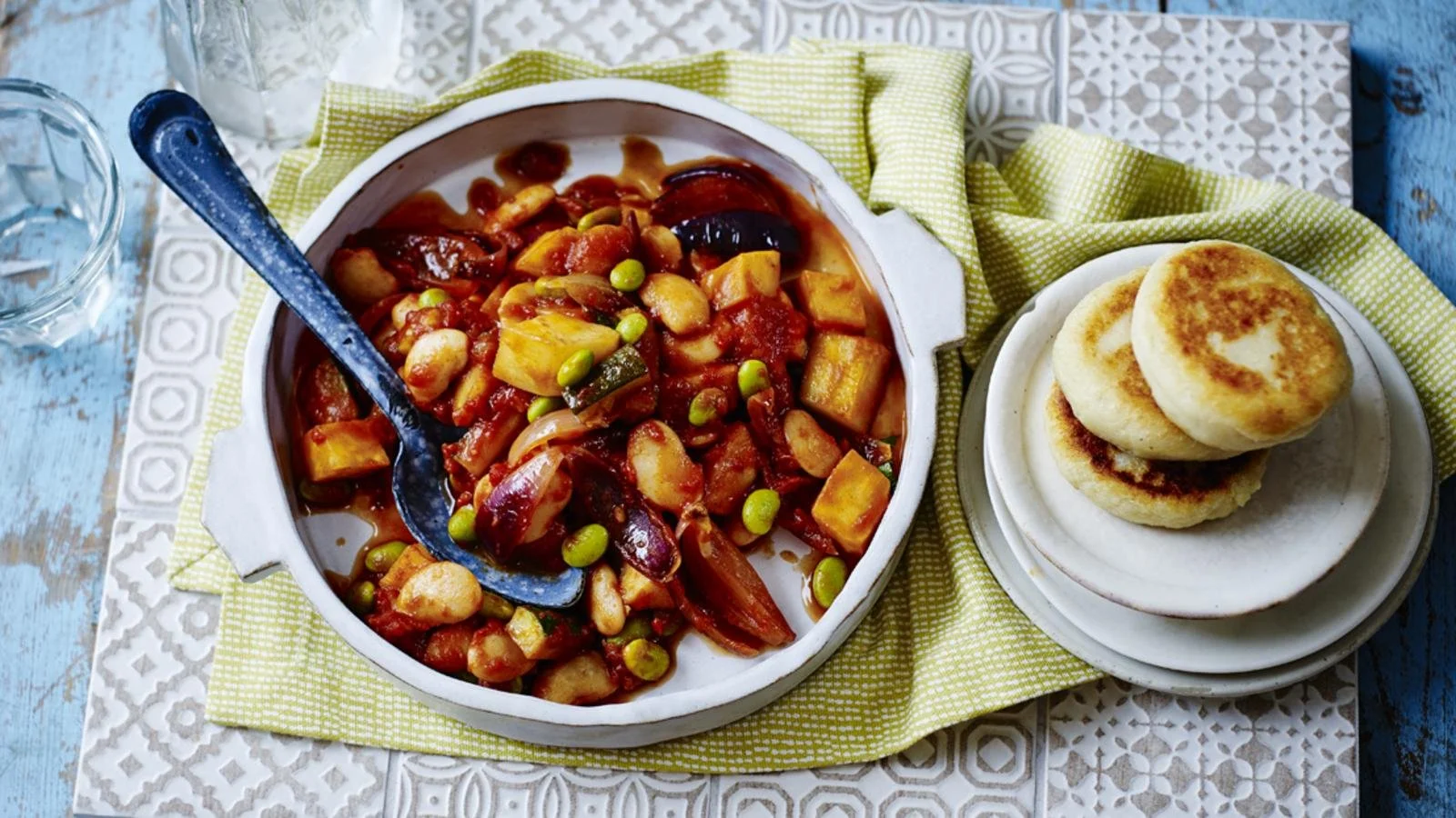 Hearty Mediterranean Bean Stew served with crispy potato griddle cakes.