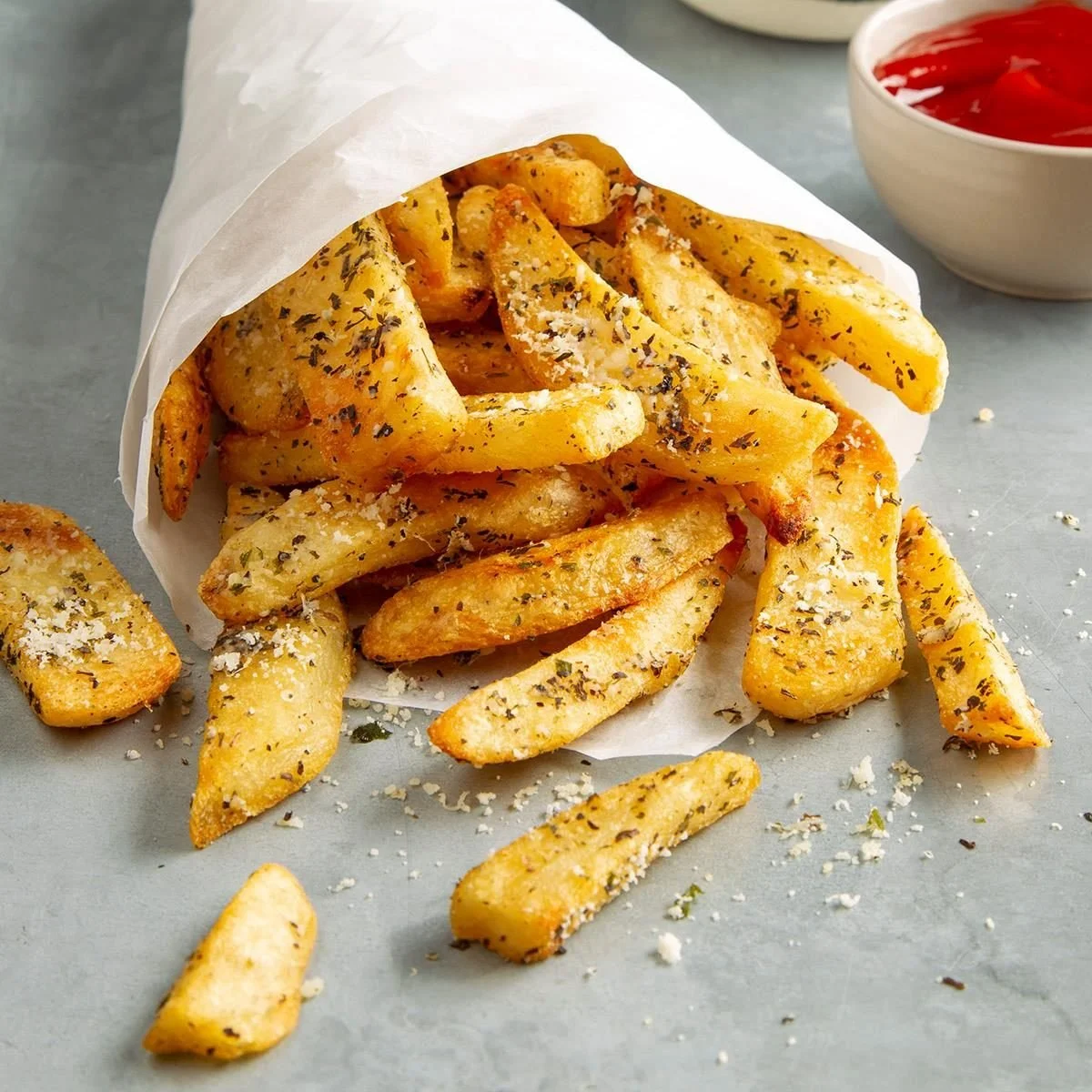 Crispy herbed steak fries served as a delicious side dish