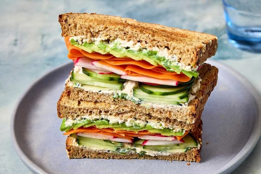 High-protein cucumber sandwich with fresh ingredients on a plate