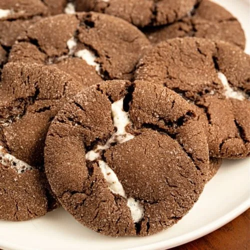 Delicious homemade hot chocolate cookies topped with marshmallows and chocolate chips