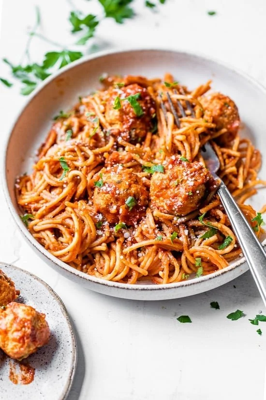 Delicious Instant Pot whole wheat spaghetti served with turkey meatballs.