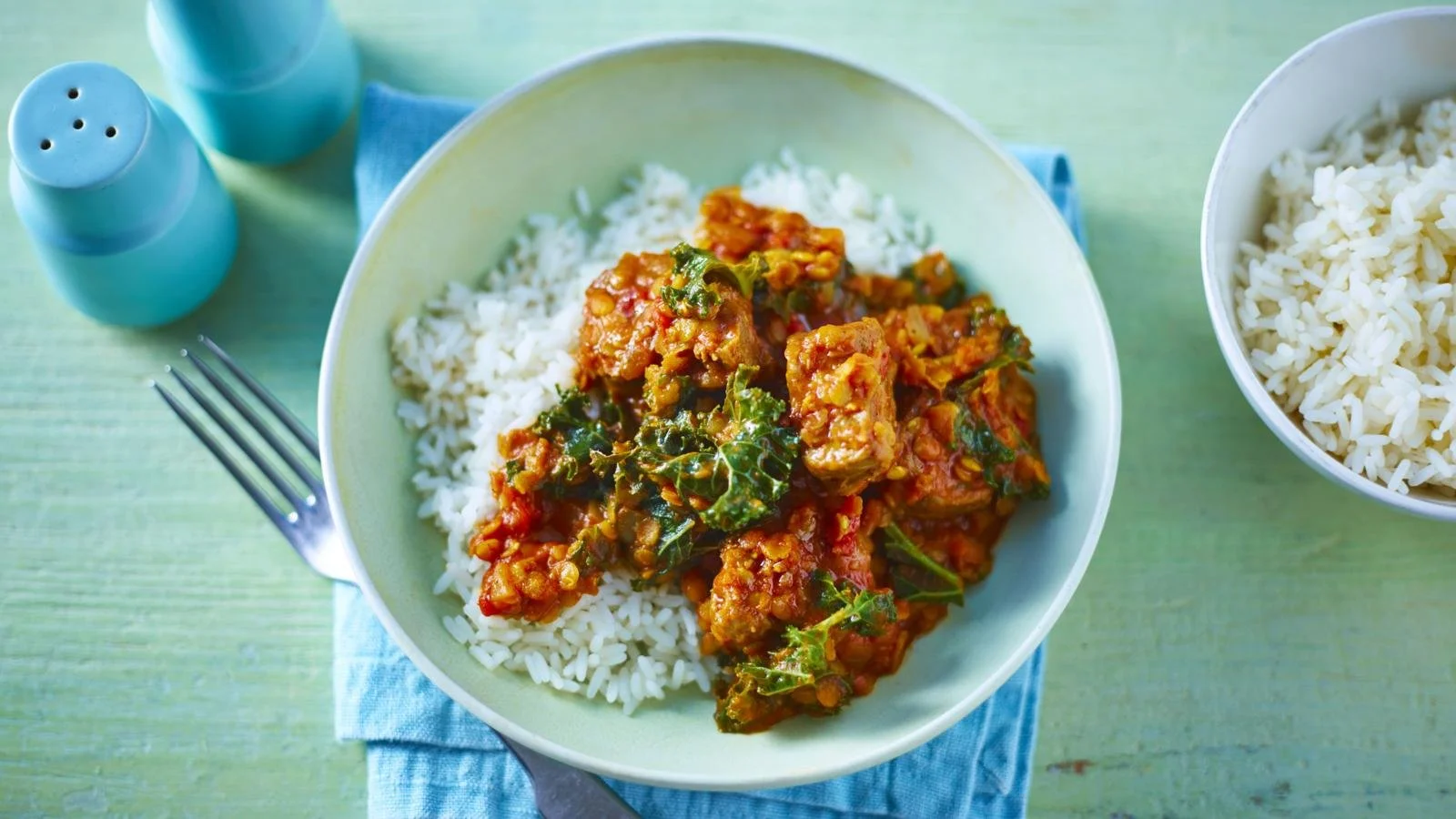Delicious Lamb Lentil Curry served in a bowl with fresh herbs