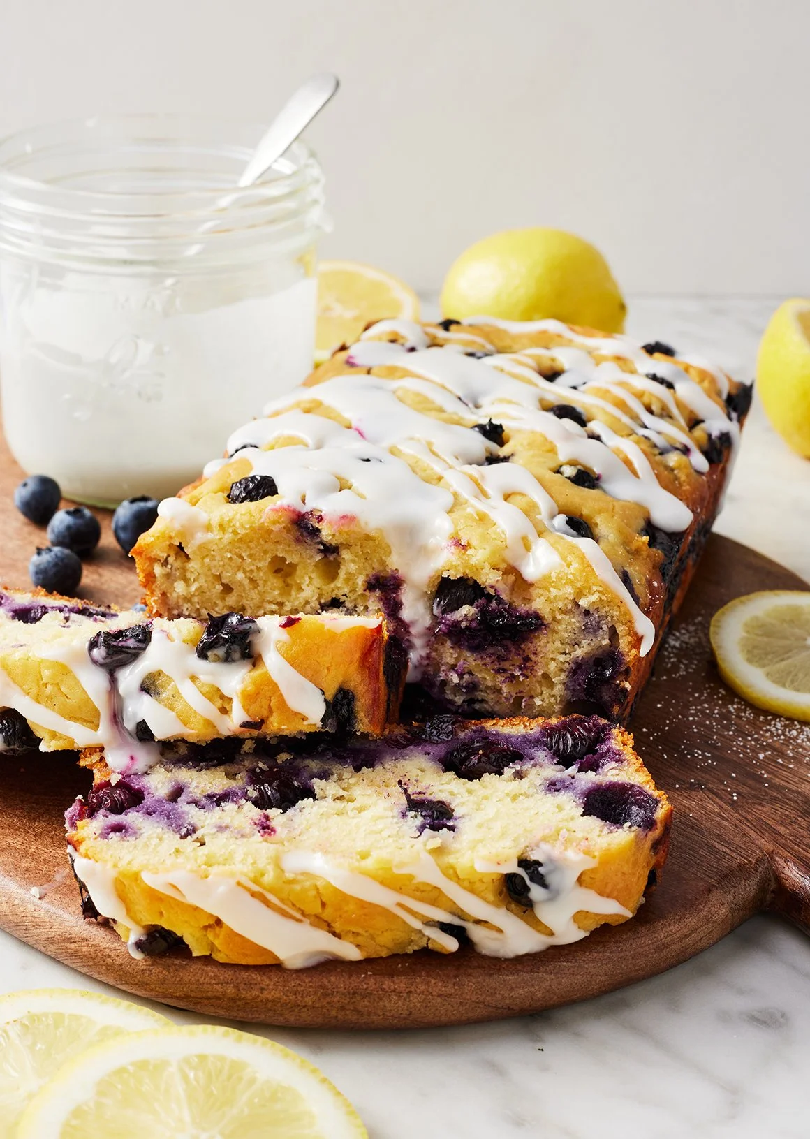Deliciously baked Lemon Blueberry Bread on a wooden table