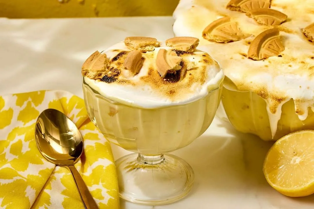 Delicious no-bake lemon meringue fluff dessert in a glass bowl.
