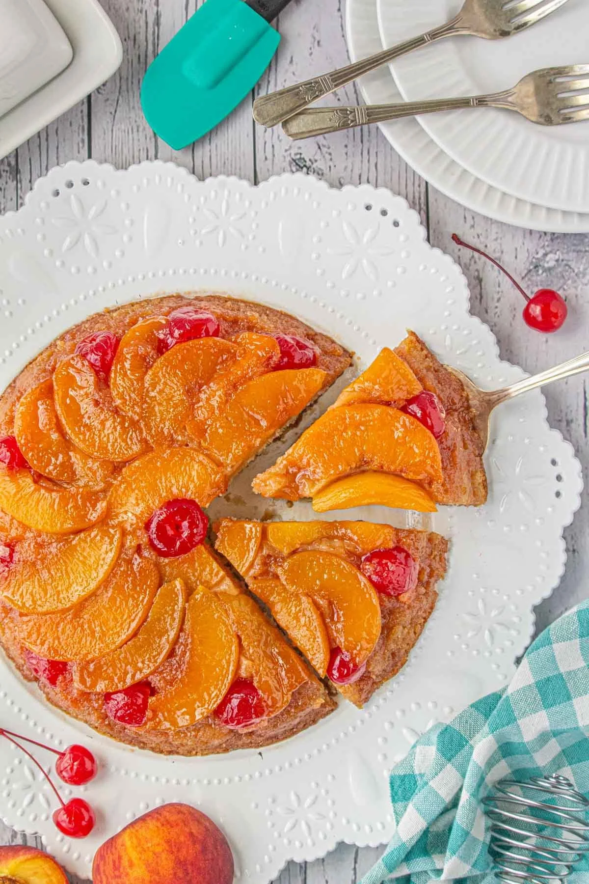 Delicious Peach Upside-Down Cake served on a rustic wooden table