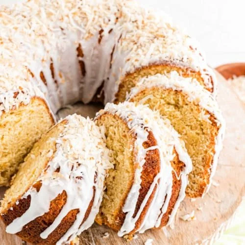 Delicious Pina Colada Pound Cake with coconut and pineapple toppings