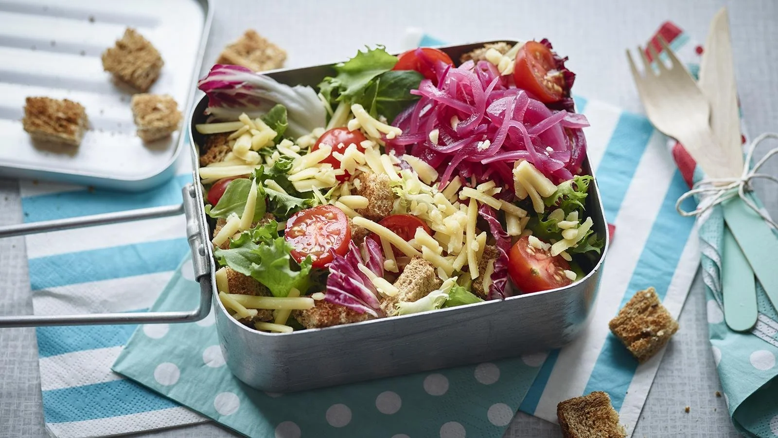 Ploughman's Lunch Salad with cheese, bread, and fresh vegetables
