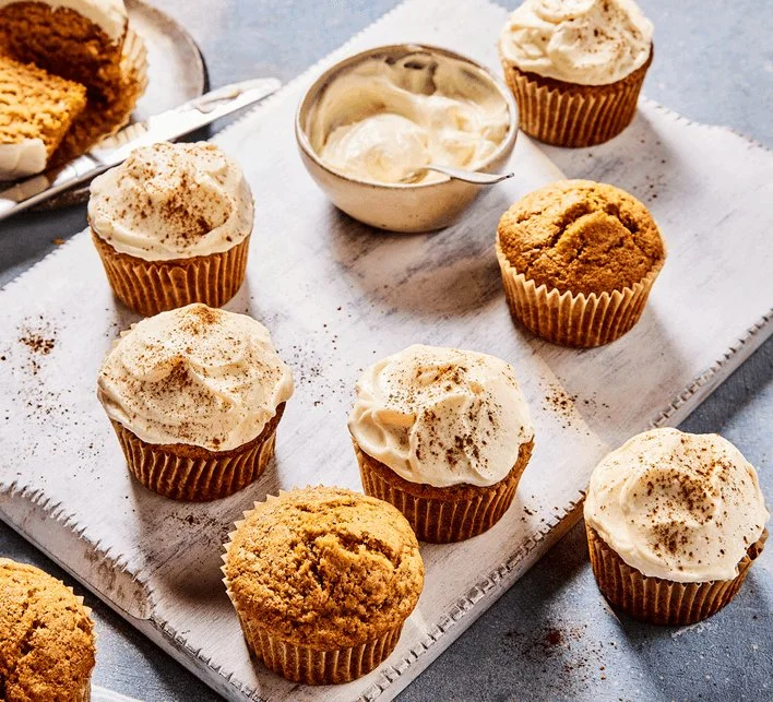 Freshly baked pumpkin muffins with spices and a golden-brown top