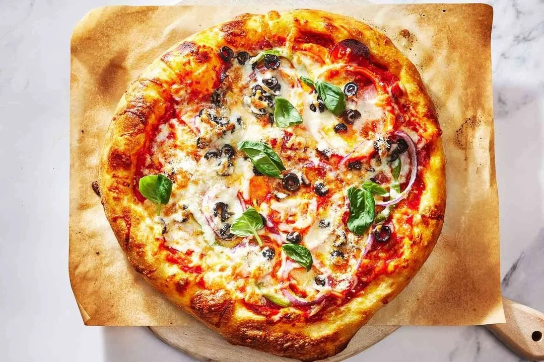 Delicious Screamin' Sicilian Frozen Pizza with a crispy crust and fresh toppings