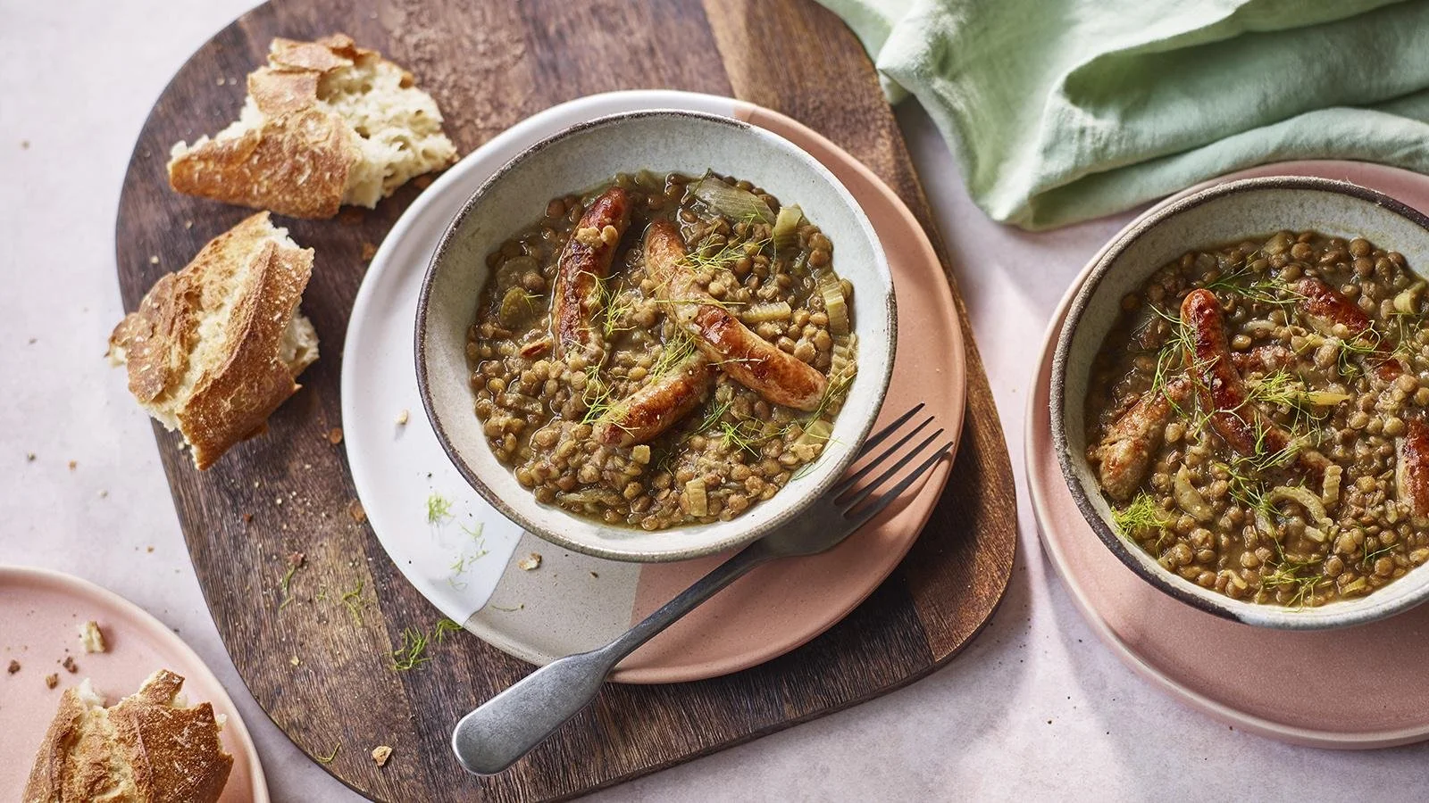 A delicious slow cooker sausage and lentil casserole served in a bowl