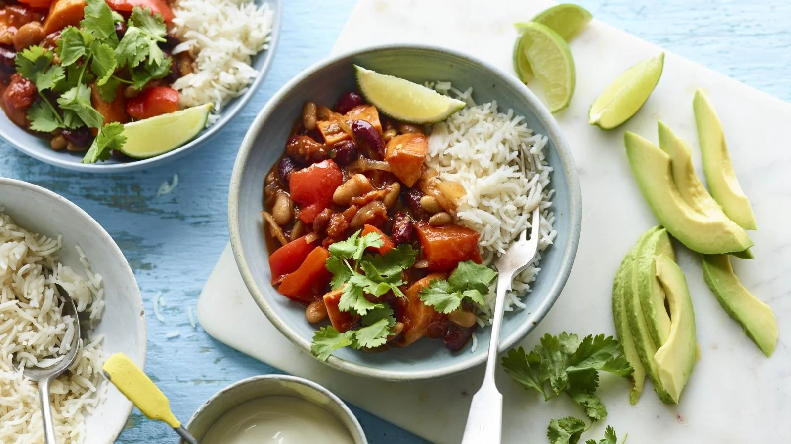 Bowl of slow cooker vegan bean chili topped with fresh cilantro