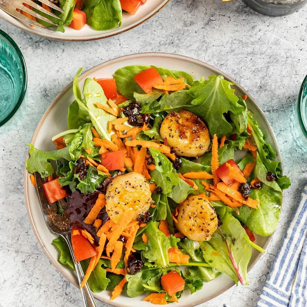 Delicious Special Scallop Salad with fresh greens and vibrant dressing