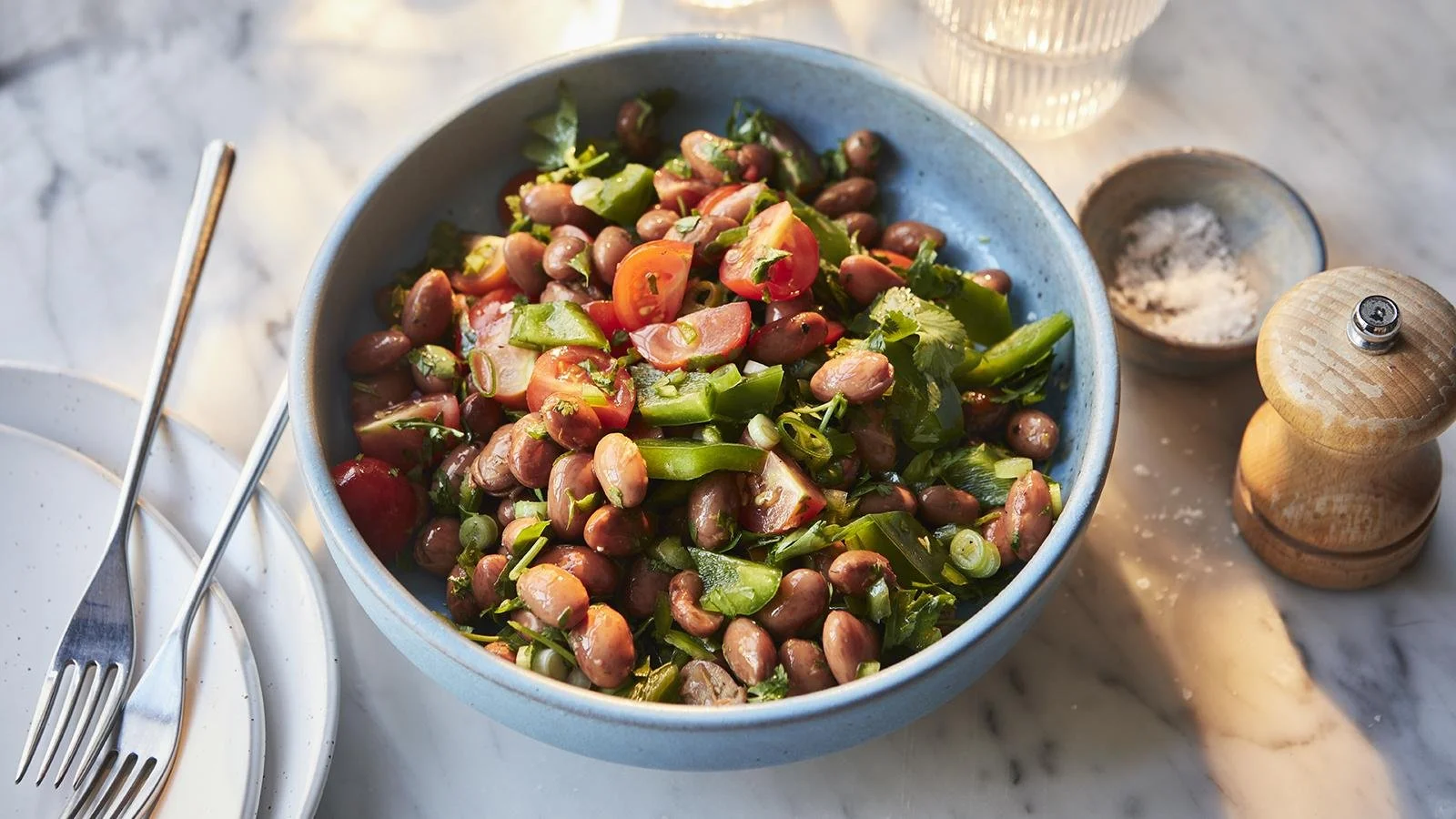 Colorful spicy bean salad with mixed beans and vegetables.