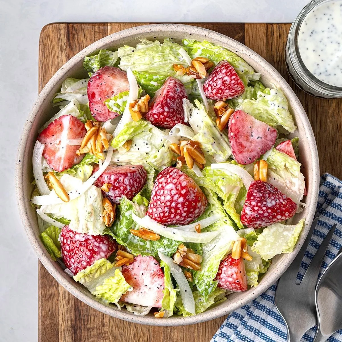 Delicious Strawberry Poppy Seed Salad with fresh strawberries and poppy seeds.