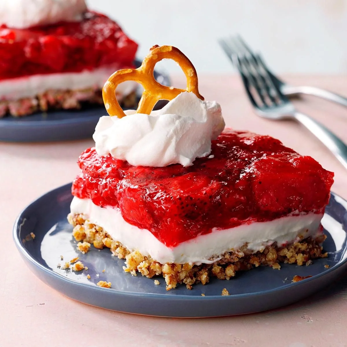 Delicious Strawberry Pretzel Salad with layers of strawberries and pretzel crust