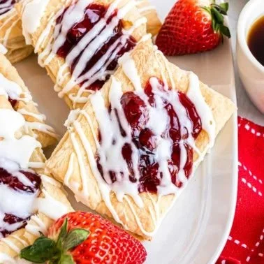 Freshly baked Strawberry Toaster Strudels with flaky pastry and strawberry filling