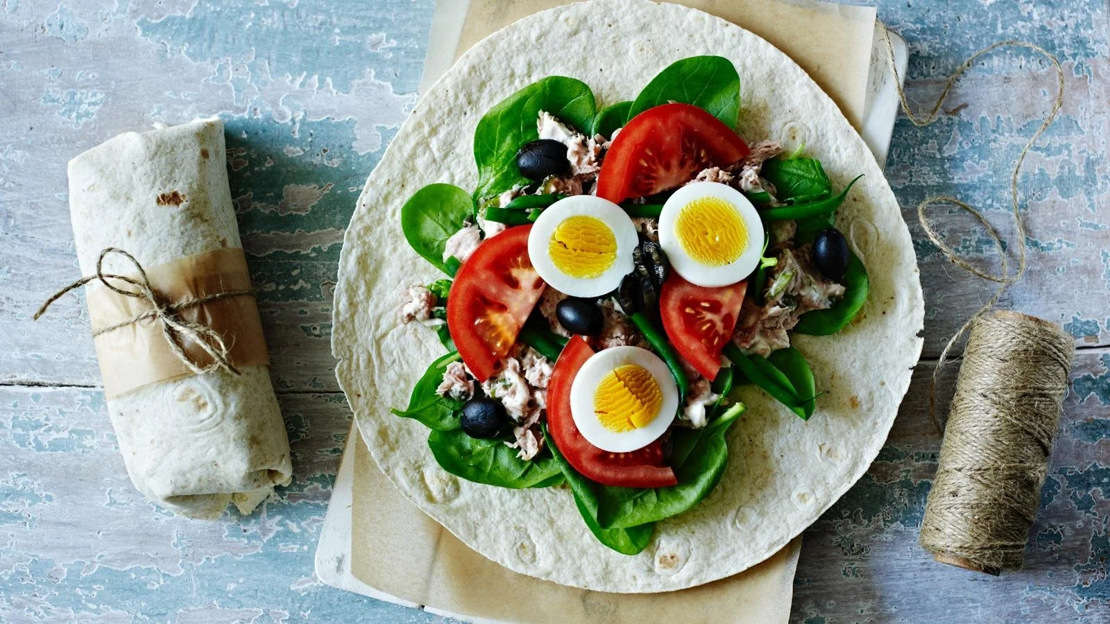 Tuna Niçoise Wrap with fresh vegetables and olives