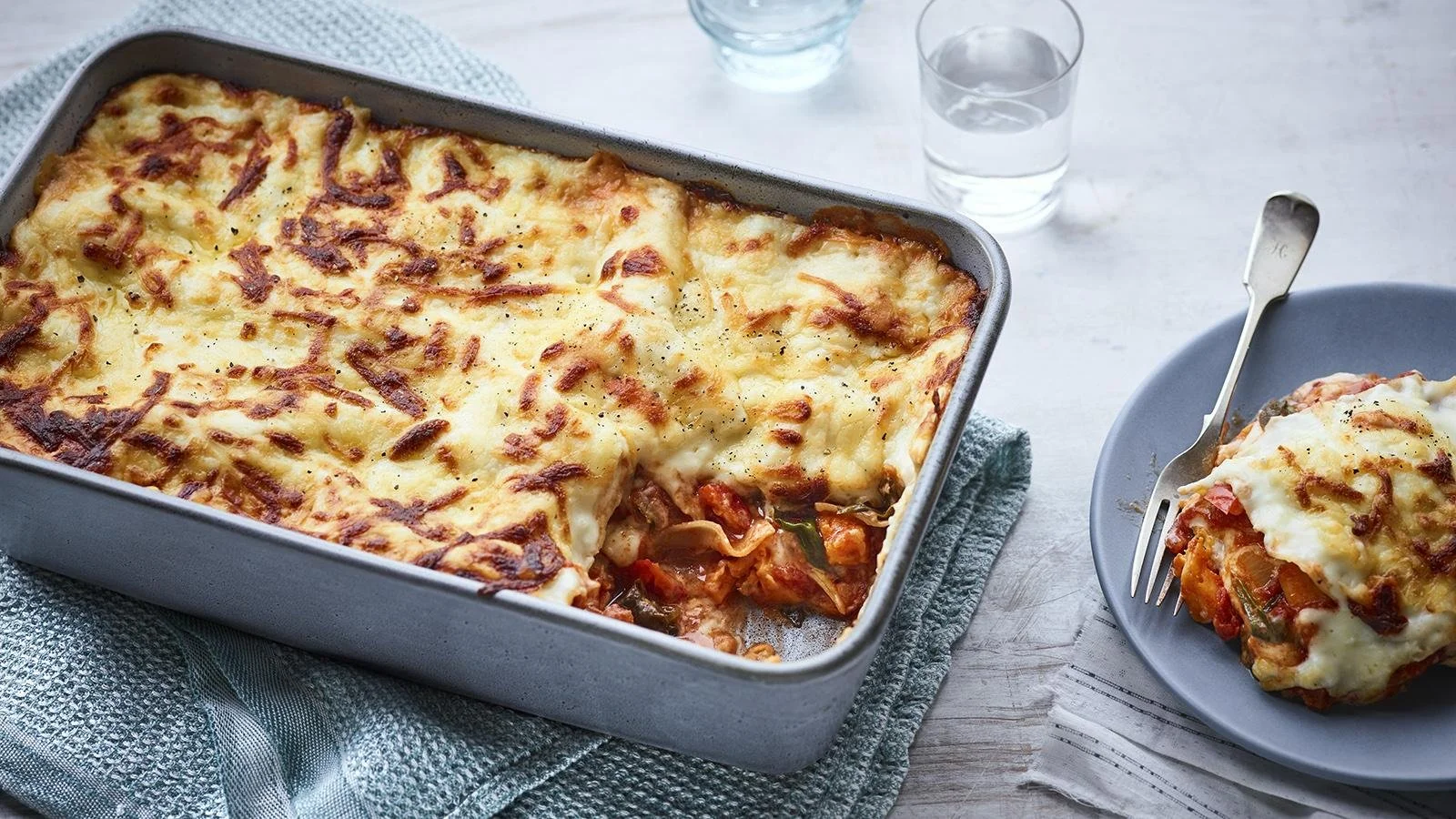 Delicious homemade Vegetable Lasagne with layers of fresh vegetables and cheese