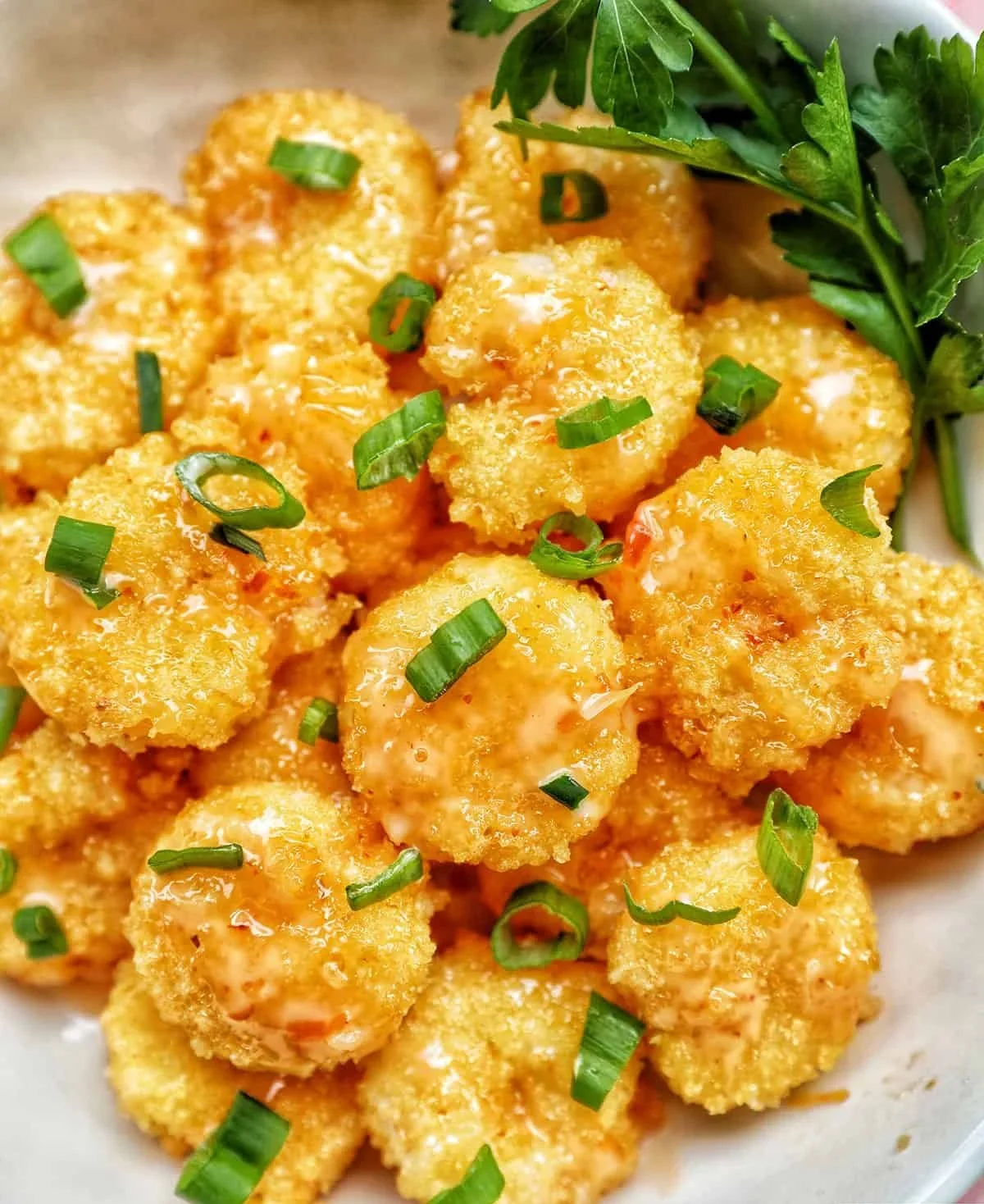 Crispy Air Fryer Bang Bang Shrimp served with a spicy sauce
