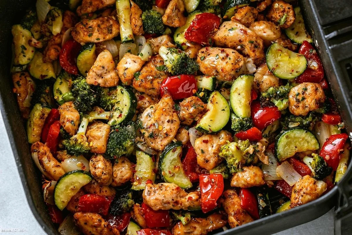 Air Fryer Chicken Breast with assorted vegetables cooked to perfection