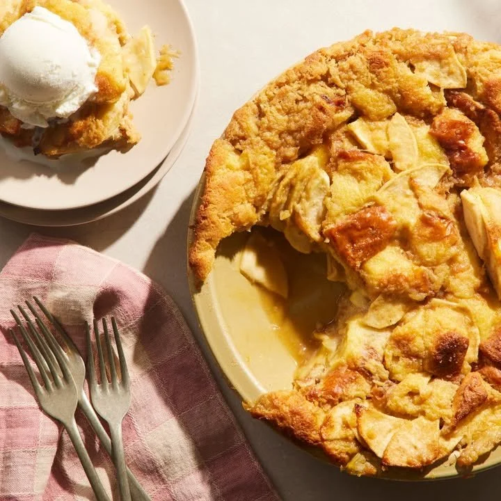 Delicious Apple Bread Pudding served with caramel sauce