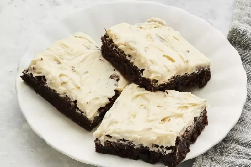 Delicious Baileys Irish Cream Brownies topped with chocolate ganache.