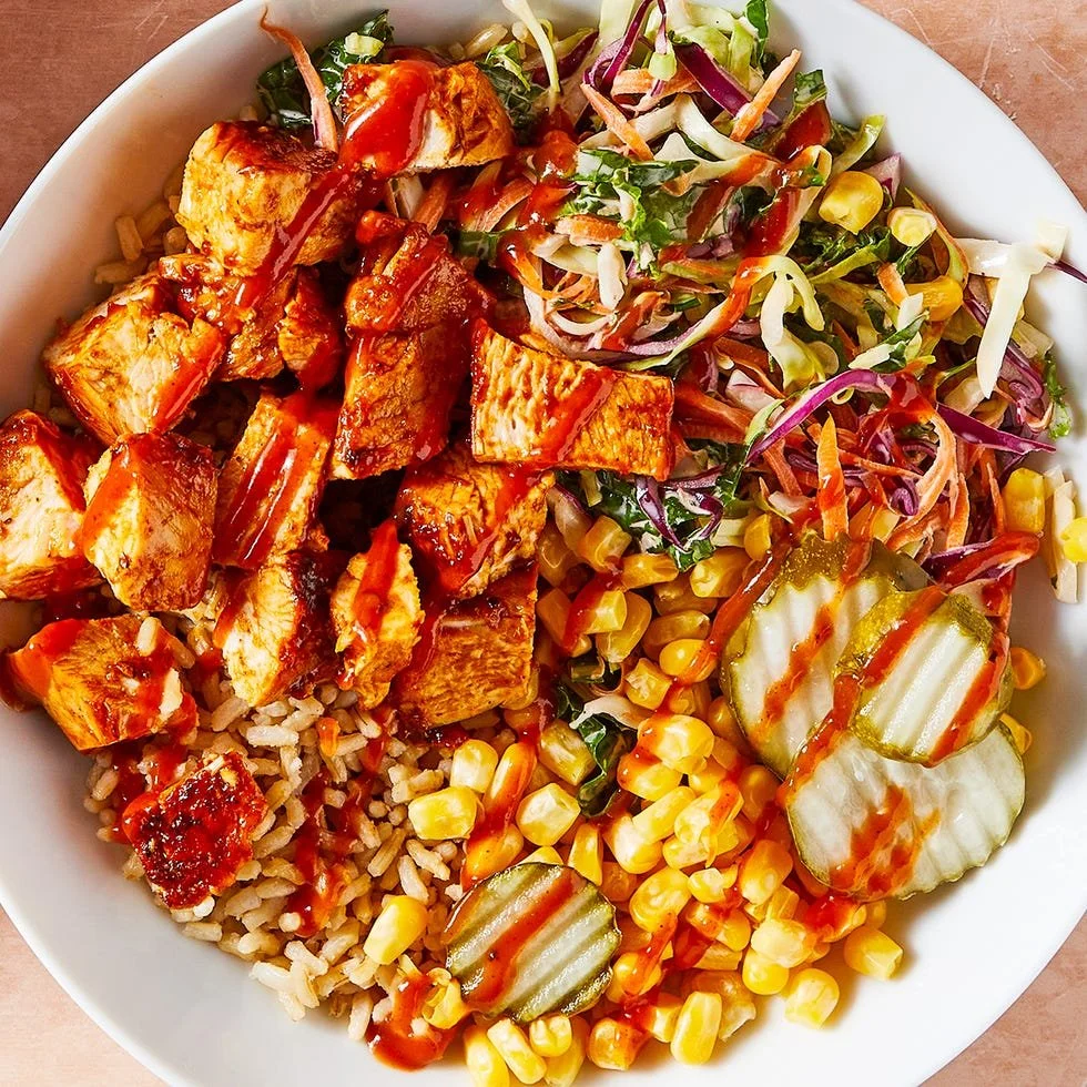 Colorful BBQ Protein Bowls with grilled chicken, veggies, and sauce