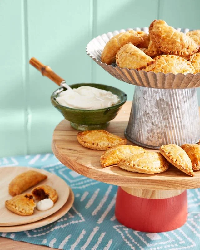 Delicious Beef and Raisin Empanadas served on a rustic plate.